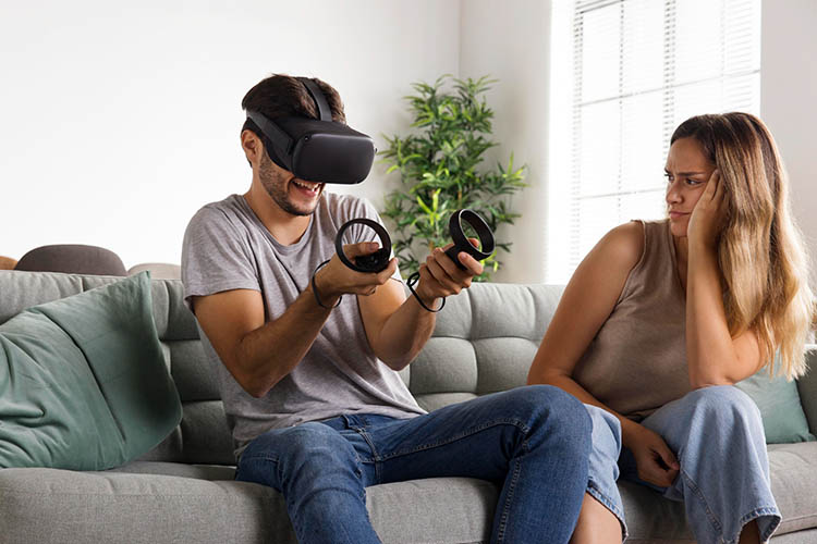 Single woman looking frustrated while dating a playful but immature man-child